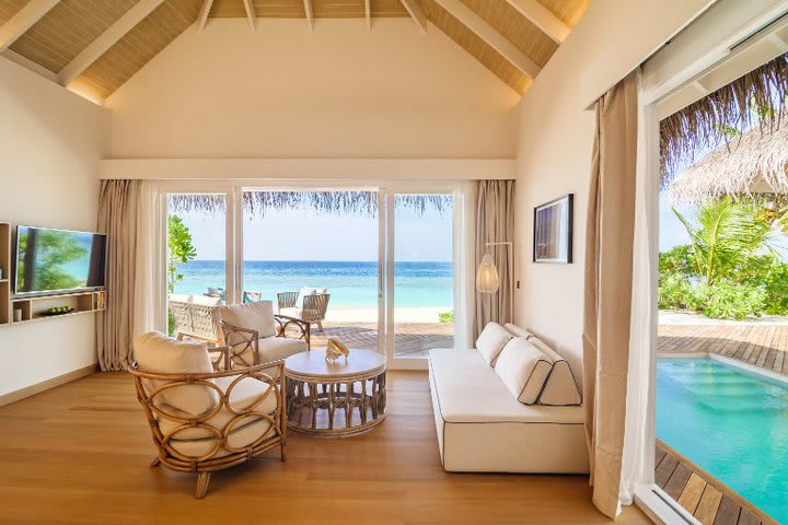 Sitting area of a deluxe suite on the beach