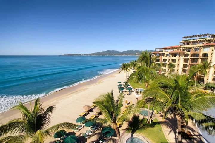 The beach area has sun loungers