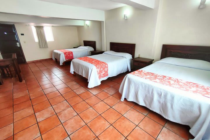 Guest rooms with three beds