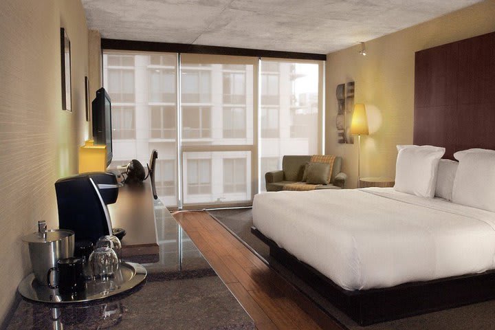 Guest rooms at dana hotel feature a sober and elegant decoration