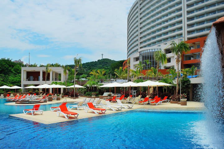 Sun loungers next to the pool