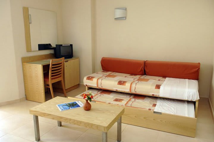 Sofa bed in a guest room at the Fiesta Tanit in the city of Sant Antoni de Portmany