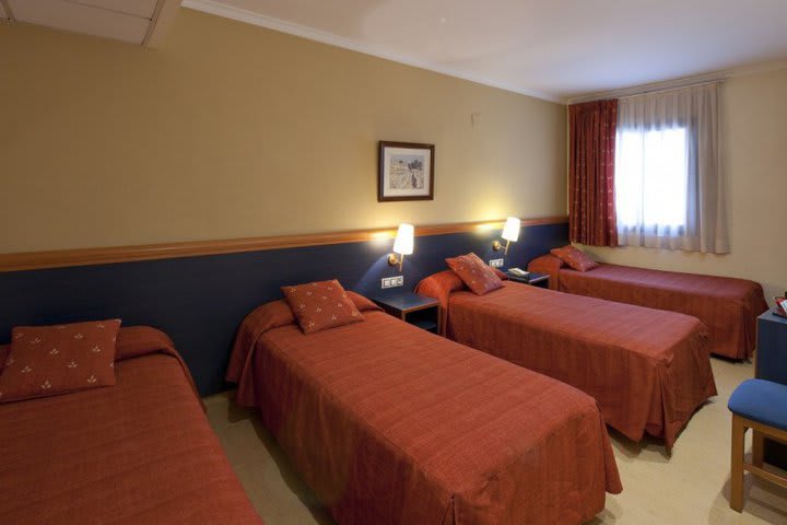 Interior view of a quadruple guest room