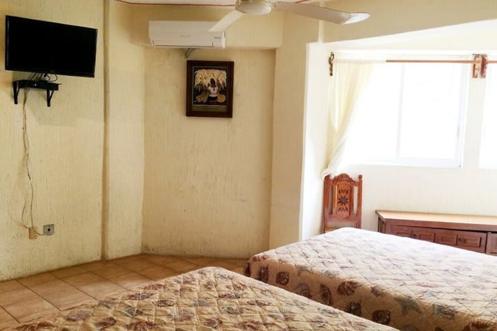 Guest rooms are equipped with TV and air conditioning