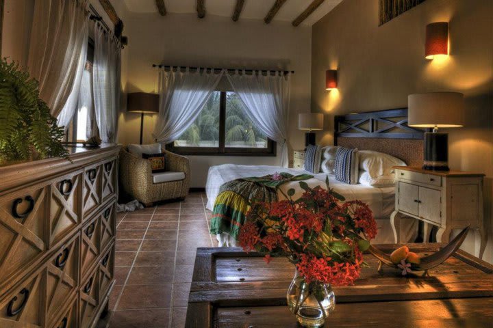 Guest rooms at CasaSandra are decorated with handcrafted furniture