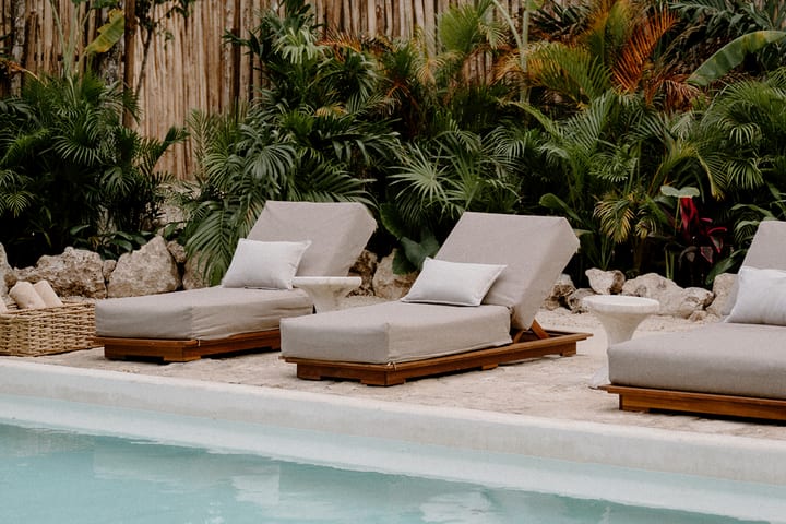 Sun loungers next to the pool