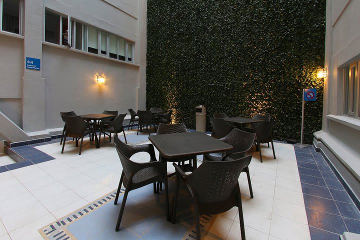 Indoor courtyard with tables and chairs