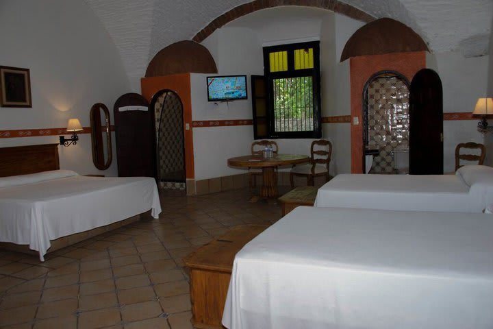 The in-room furniture has colonial style