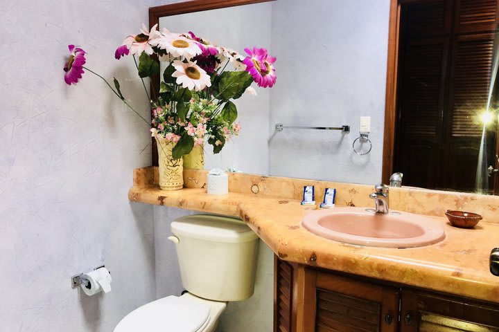 Private guest bathroom with shower in the Sunset guest room