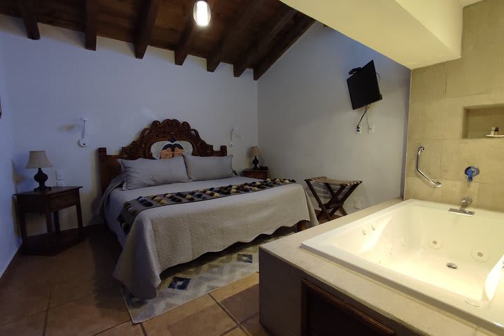 Bedroom with whirlpool tub in a family apartment