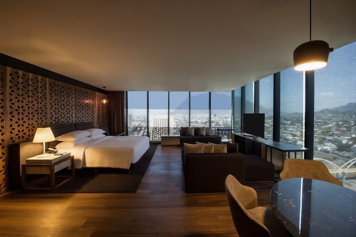 Interior view of a master suite with city view