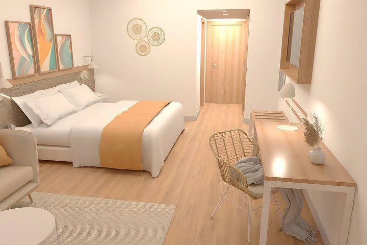 Habitación con área de descanso