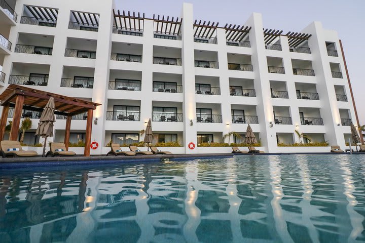 Sun loungers next to the pool