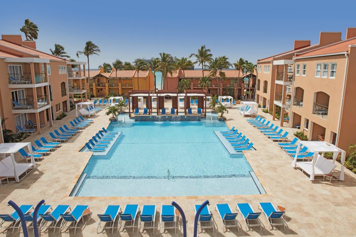 Pool with sun loungers