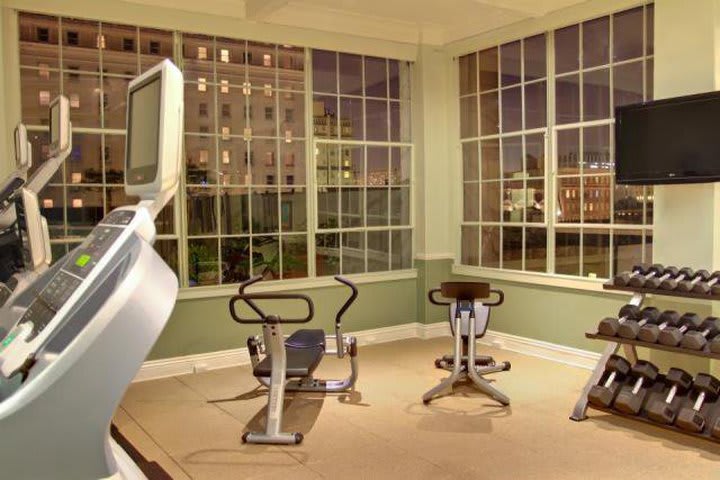 Work out in the fitness center of The Prescott, a Kimpton Hotel