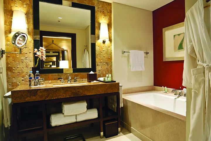 Some rooms are fitted with private bathroom with tub and shower