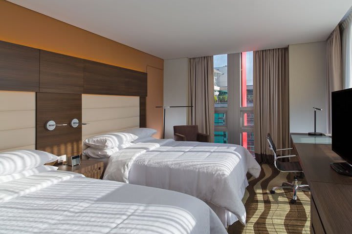 Guest rooms are equipped with floor-to-ceiling windows