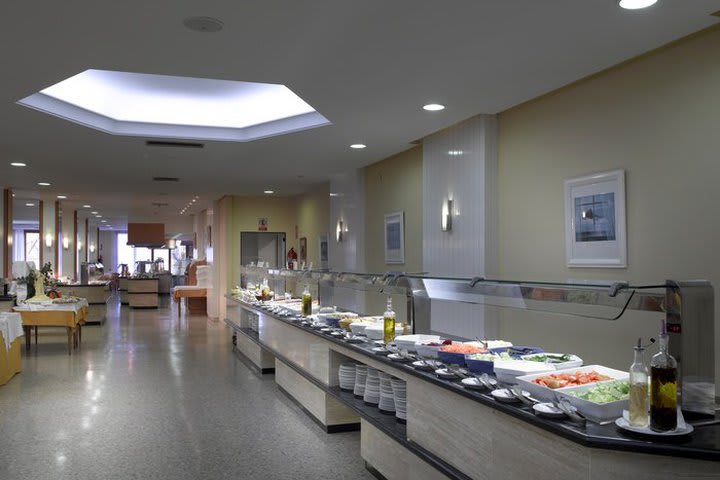 Buffet in the restaurant at the Fiesta Tanit hotel near the beach in Sant Antoni de Portmany