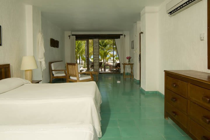 Deluxe guest room with ocean view at the Na Balam Hotel on Isla Mujeres
