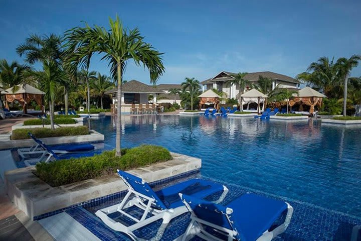 The pool area also has sun loungers