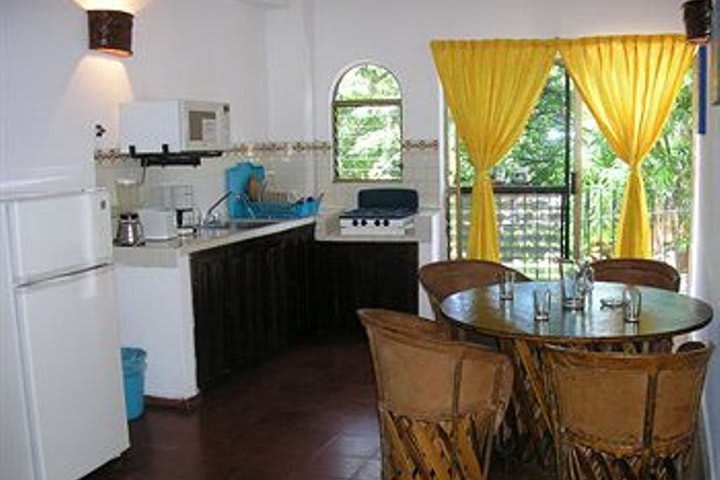 Kitchen and dining area in a suite