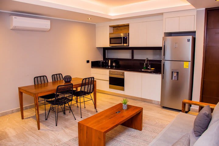 Sitting area and kitchen in the apartment for 3 guests