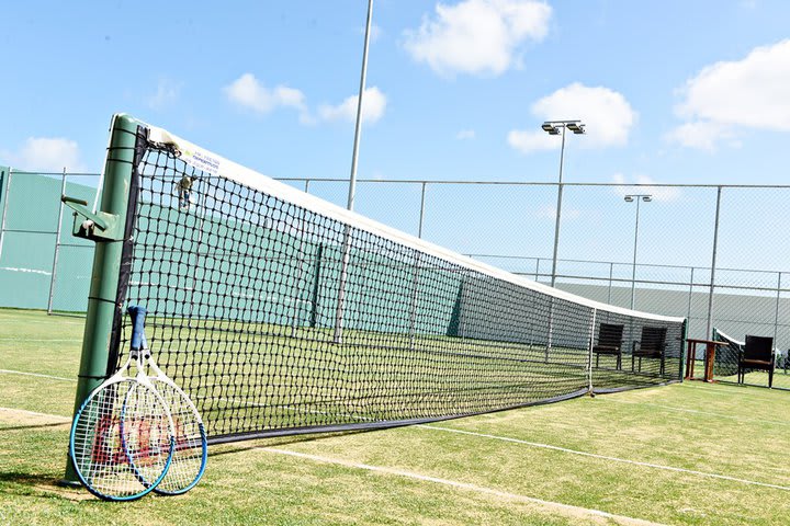 Facilities include tennis courts and a fitness center