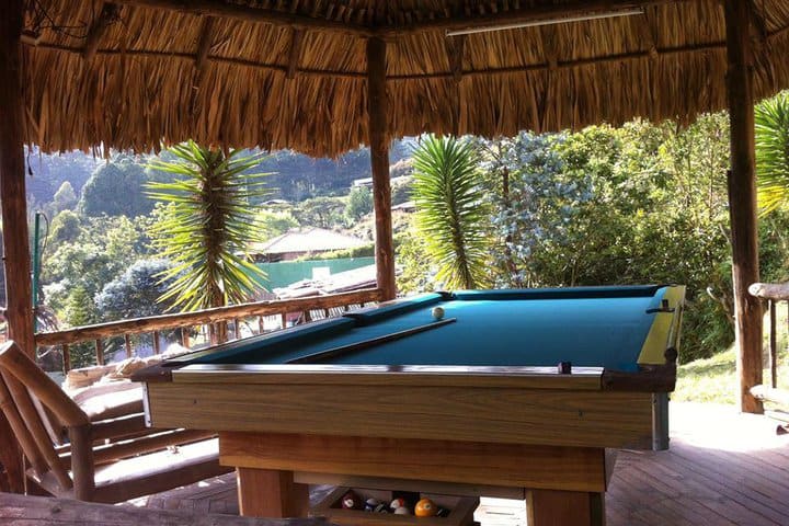 There is a billiard table on the terrace