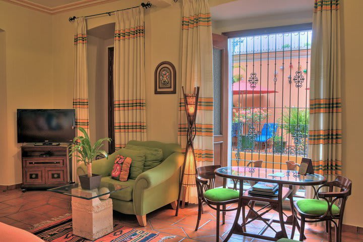 Sitting area in a guest room at Hotel Parador San Miguel in Oaxaca