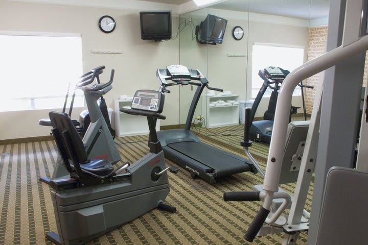 Work out in the fitness center at La Quinta Inn & Suites Orlando UCF