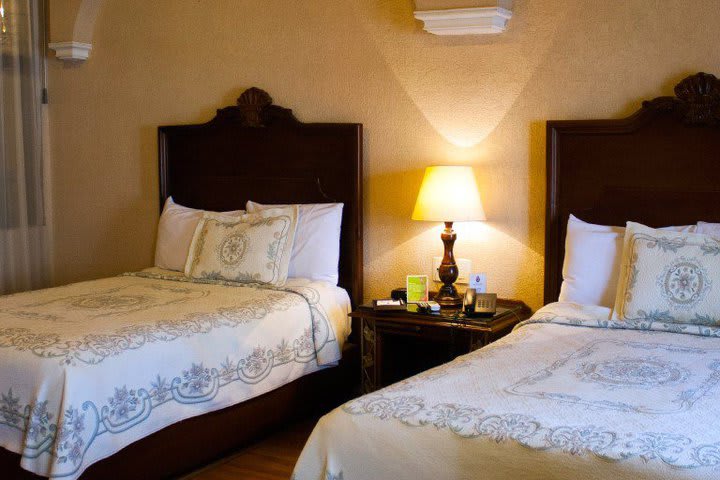 Guest rooms at the Morales Historical and Colonial Downtown Core hotel offer air conditioning