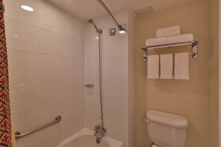 Some rooms have private bathroom with tub and shower