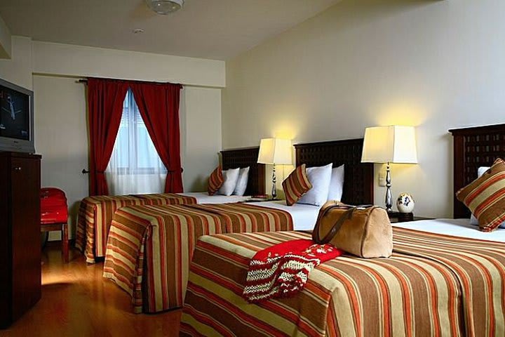 Triple guest room at Hotel San Agustin El Dorado