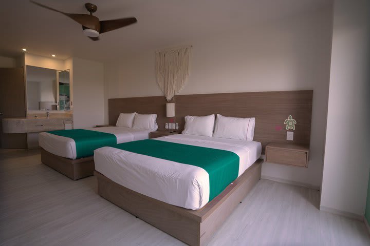 Deluxe guest room with two double beds