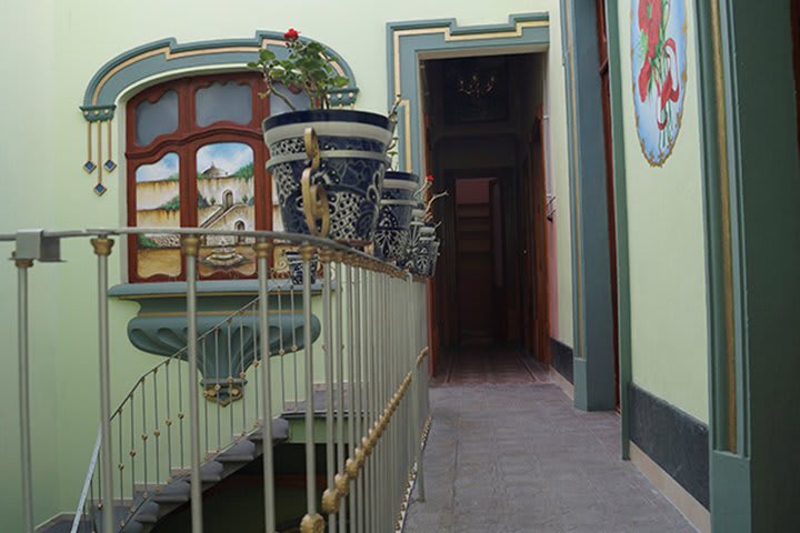 The mansion is decorated with paintings by a local artist