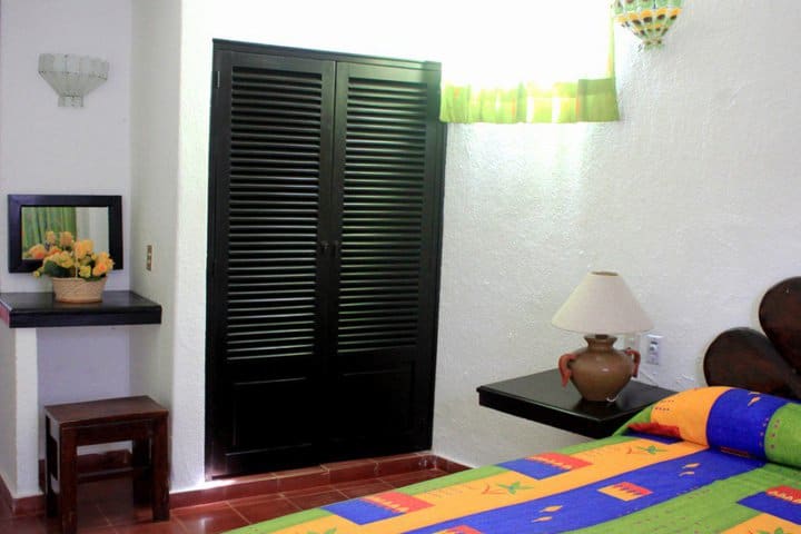 Closet and dressing table of a junior suite with balcony