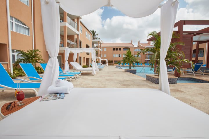 Sun lounger next to one of the pools