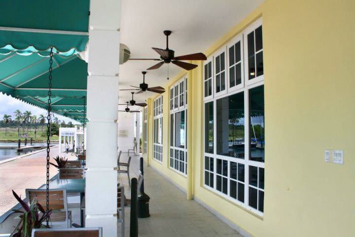 Enjoy your meals on the terrace of the restaurant at the Shelter Bay Marina Hotel