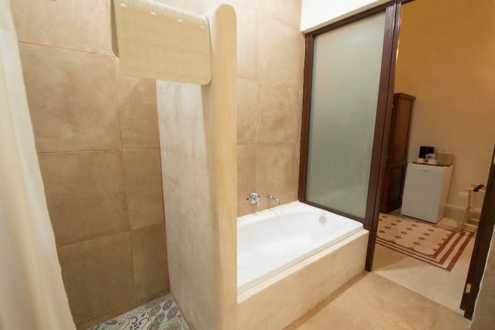 Bathroom with private shower