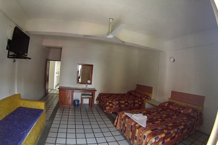 Standard guest room with two double beds