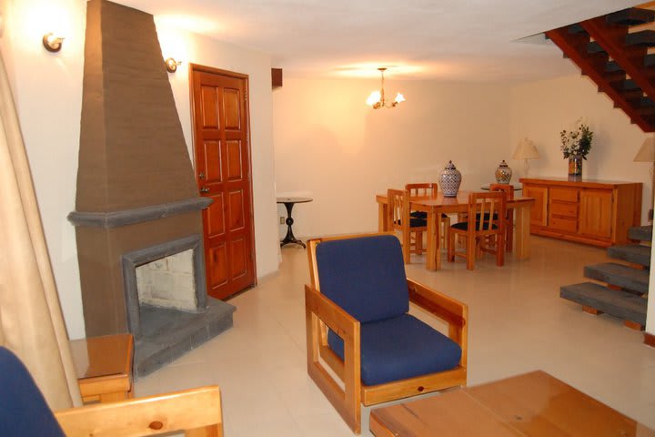 The master suite at the Real de Minas hotel is equipped with table and chairs