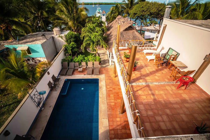 Sun loungers next to the pool