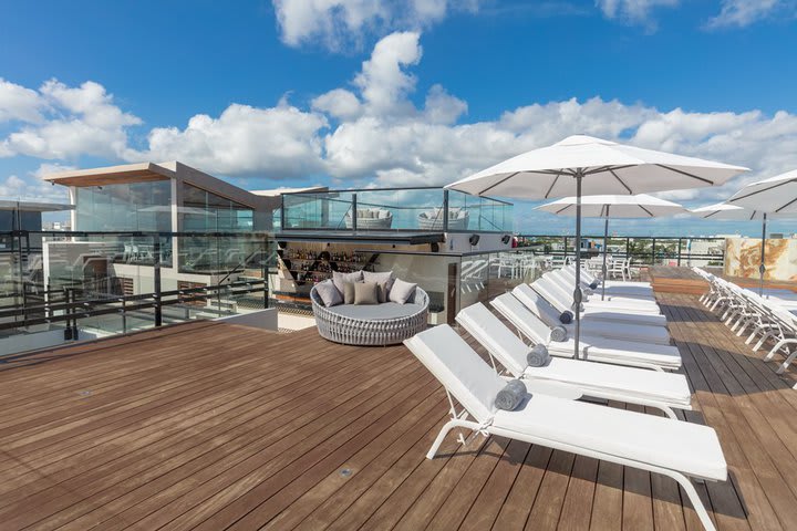 Sun loungers next to the pool