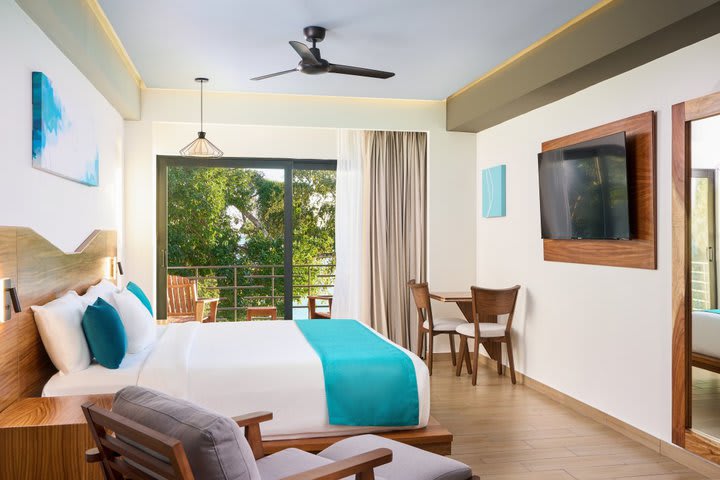 King guest room with partial lagoon view