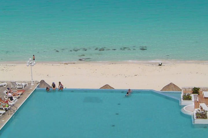 The swimming pool features a shallow area for children