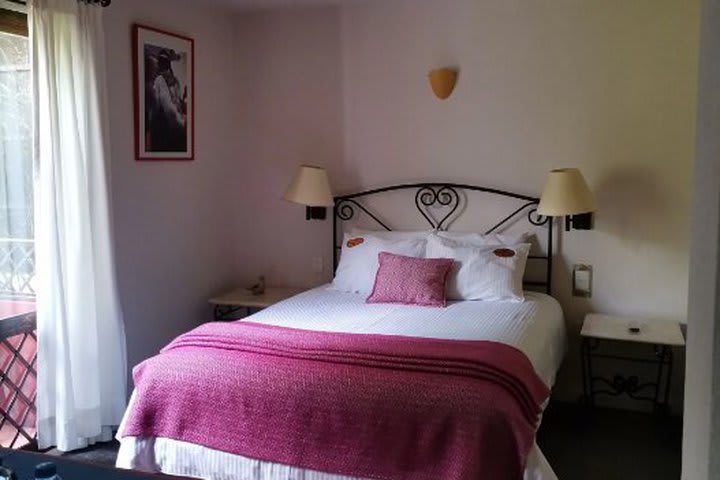 Interior view of a deluxe guest room with 1 double bed