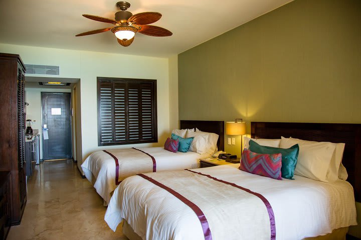 Bedroom with two beds in a suite with two bedrooms