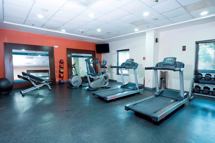 The fitness center has treadmills and weights