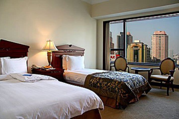 Howard Johnson Plaza Hotel Shanghai has guest rooms overlooking the city