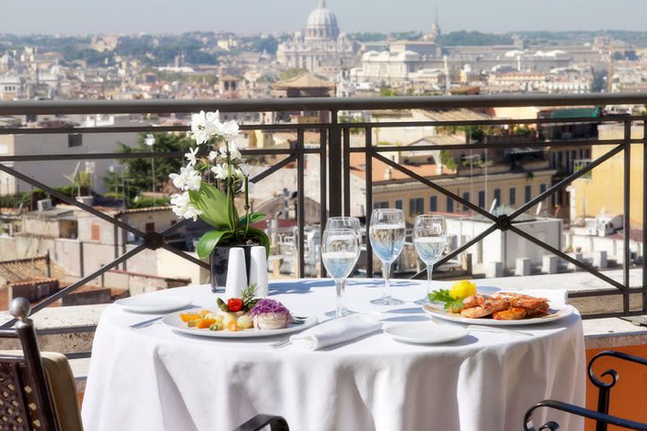 The restaurant at Hotel Bernini has a terrace overlooking the dome of Saint Peter's Basilica